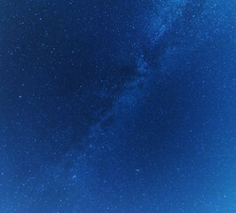 Wall Mural - a magical starry night on the river by the milky way and a comet in the sky