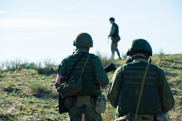 Russian special forces soldiers with weapon take part in military maneuver