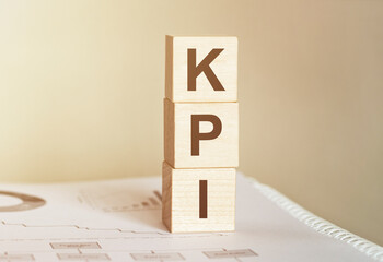 Poster - word kpi made with wood building blocks