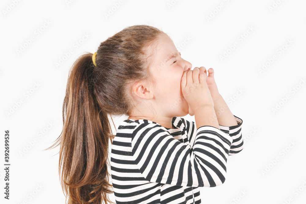 Loudly yelling girl with hands holding near her mouth and tightly ...