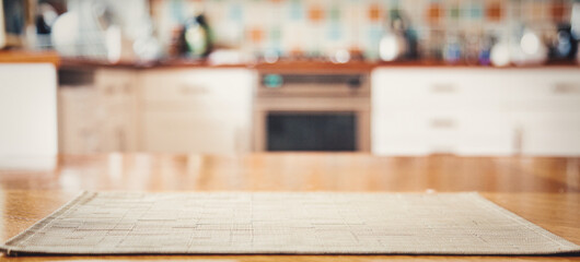 Wall Mural - blurred kitchen interior with napkin on table