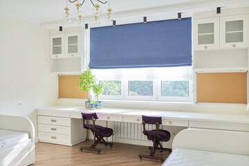 Interior of children's room for two children in light colors