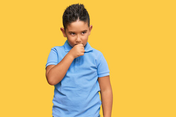 Poster - Little boy hispanic kid wearing casual clothes feeling unwell and coughing as symptom for cold or bronchitis. health care concept.