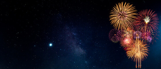 Wall Mural - fireworks with blur milky way background