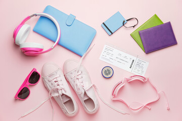 Set of travel items on color background