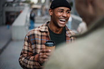 Wall Mural - Handsome happy young african man holding takeaway