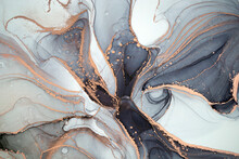 High Resolution. Luxury Abstract Fluid Art Painting In Alcohol Ink Technique, Mixture Of Black, Gray And Gold Paints. Imitation Of Marble Stone Cut, Glowing Golden Veins. Tender And Dreamy Design.