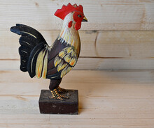 Handmade Wooden Rooster Standing On Wooden Bench