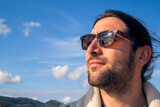 Fototapeta Boho - photograph of a man with sunglasses