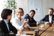 © Prostock-studio - Diverse Business People Having Corporate Meeting In Modern Office