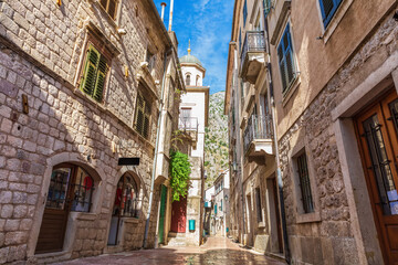 Medieval street in the Old Town of Kotor not far from Saint Michael Church, Montenegro