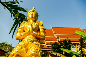 Wall Mural - statue of buddha in thailand, digital photo picture as a background