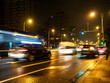 urban traffic in a rainy night city