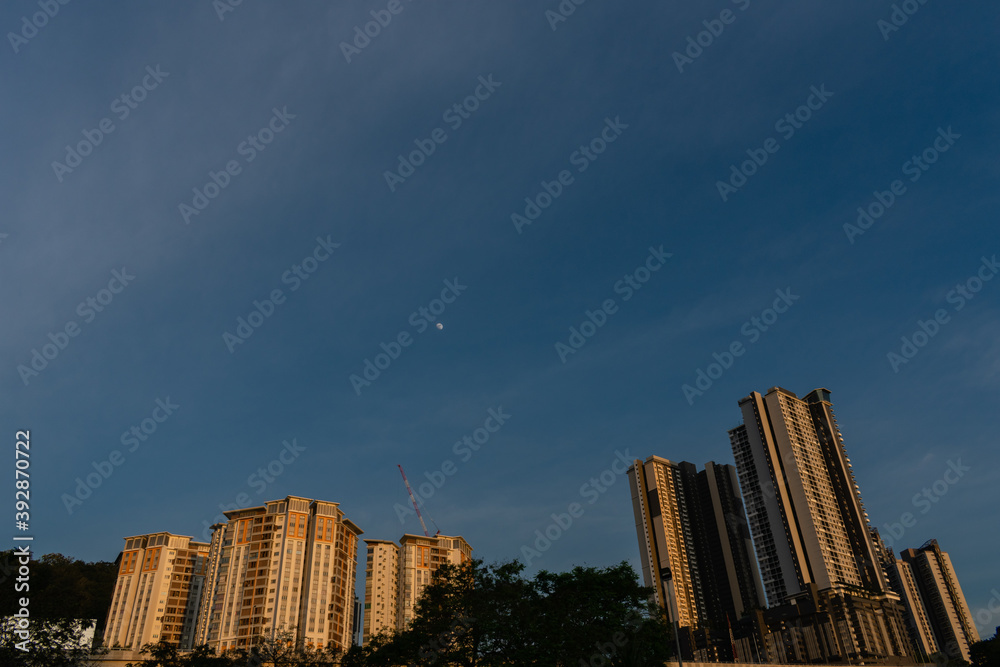 Apartment and condominium blocks during golden hour sunset with the ...