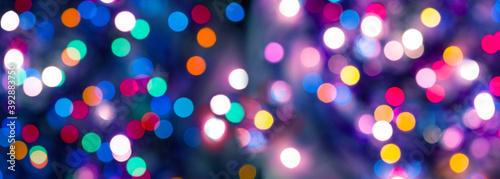 Abstract colorful shiny bokeh in Christmas night © lola1960
