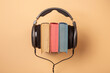 © stasknop - headphones on books, audiobooks concept
