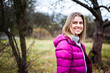 © alipko - Beautiful blonde woman in autumn tourism clothes outdoor