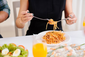 Poster - Woman using spoon when wrapping spaghetti around the fork