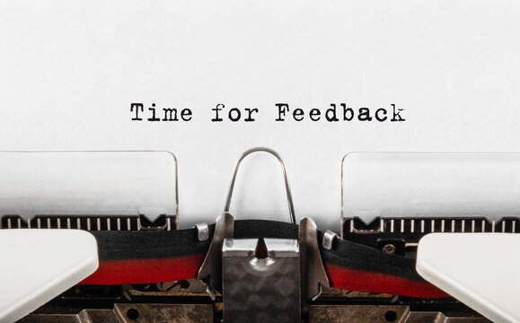 Text Time for Feedback typed on retro typewriter