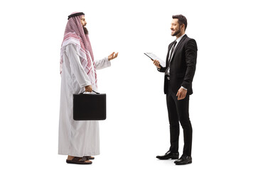 Poster - Full length profile shot of an arab businessman talking to a man in a suit