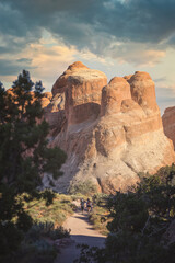 Wall Mural - People walking in arches national park