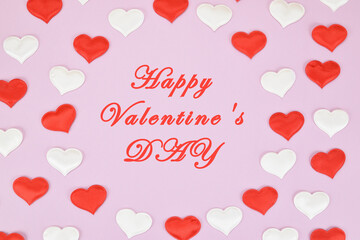 Wall Mural - Red and white hearts on a pink background around the congratulation to everyone in love