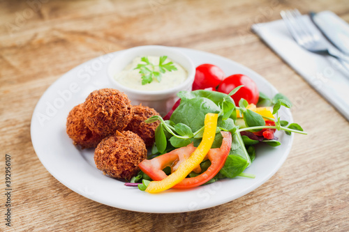 Cuadros en Lienzo Vegan mushrooms balls - deep-fried falafel starter