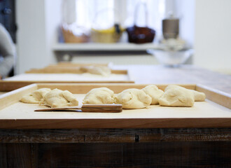 Preparation of ingredients: flour, water, dough for onion flatbread at The regional Museum of Cebularz in Lublin, Poland