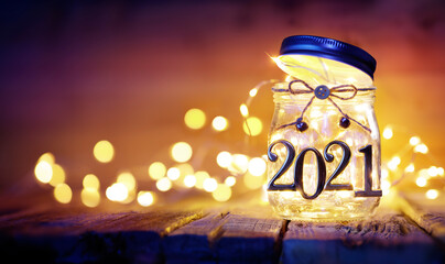 Wall Mural - open 2021 - christmas lights in the jar with golden numbers - defocused background