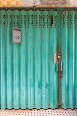Poster - Old mail box on classic folding metal gate in Hong Kong