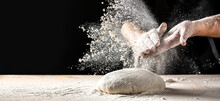 Photo Of Flour And Men Hands With Flour Splash. Cooking Bread. Kneading The Dough. Isolated On Dark Background. Empty Space For Text