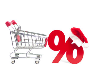 Wall Mural - Shopping cart from the supermarket and sign percent with Santa hat on white background. Shopping in the Mall, shop, shopping, a large selection. Christmas big sale