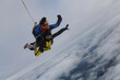 © Sky Antonio - Skydiving. Tandem jump. The flight is above clouds.