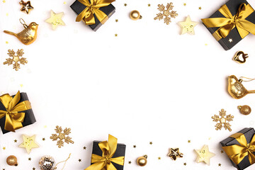 Christmas frame made of gold decorations on a white background.