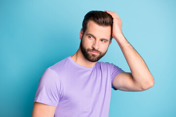 Wall Mural - Photo of young attractive man dream dreamy enjoy new hair gel hand touch head look empty space isolated over blue color background