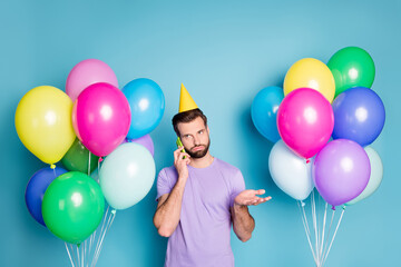 Poster - Nobody came to wish happy birthday. Photo portrait of confused man talking on phone isolated on pastel blue colored background