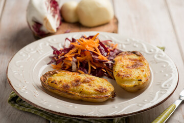 Canvas Print - oven filled potatoes with salad