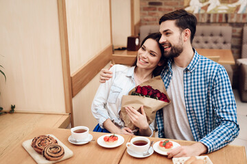 Wall Mural - Happy Young Couple Have Date in Modern Cafeteria.