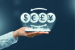 © gesrey - Currency exchange concept and through a mobile application on a smartphone