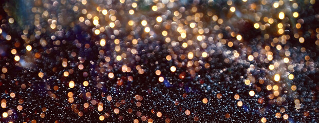 Wall Mural - abstract dark blue gold glitter background with golden bokeh lights - christmas new year background 