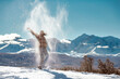 © cppzone - Happy girl tossing powder snow in mountains