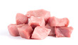 Pile of pork uncookes chopped cubes close up isolated on white background