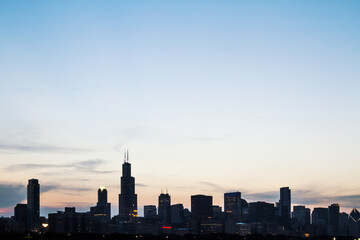 Wall Mural - Beautiful Chicago skyline at sunrise, backlit