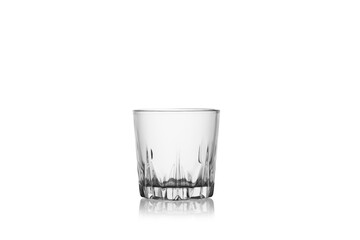 Wall Mural - Empty whiskey glass isolated on a white background without glare. Reflection on the surface. Back light.