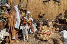 Representation Of The Nativity With Decorated Statues Of Virgin Mary, Saint Joseph And Little Jesus