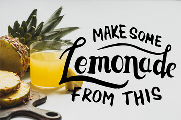 Canvas Print - fresh pineapple juice near sliced fruit on wooden cutting board near make some lemonade from this lettering on white