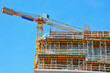 © Unkas Photo - Crane and highrise construction site