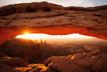 Scenic View Of Mesa Arch In Canyonlands National Park During Sunrise