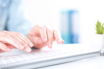 Poster - Female hands typing on computer keyboard