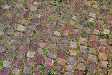 Cobblestone background with grass